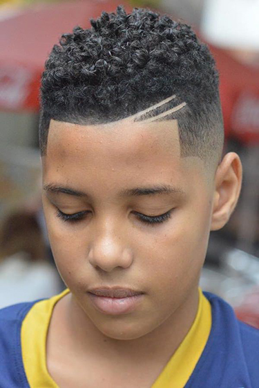 african american student with a tapered mohawk style hair cut