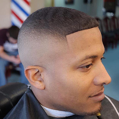 Looking for a bald fade haircut? Our barbers at African American Barber Shop in Fort Worth, TX can provide you with the best fade haircuts for men.