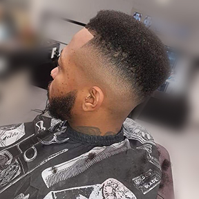 black man''s faded haircut-at barber shop