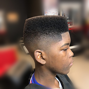 young black student eith high top fade haircut